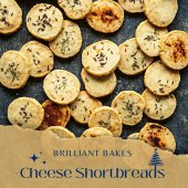 cheese shortbread rounds on a presented on a black tray