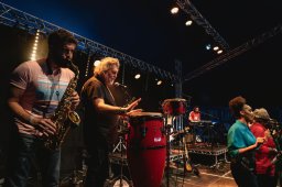 Colour photograph of Danny the Sax player, Si King and the female vocalists